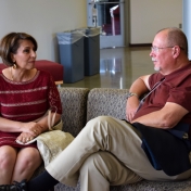 Jaleh Rezaie and Gary Kuhnhenn catching up.