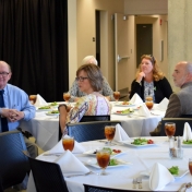 Biology faculty and staff listen to Dr. Otieno speak.