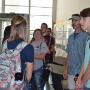 Dr. David Brown gathers students to go outside for the activity he is leading