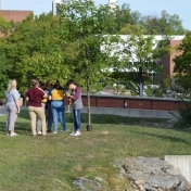 A group of Madison Southern High School students collect measurements