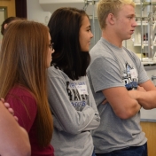 Madison Southern students watch as Radhika Dasari and Pei Gao perform "magic"