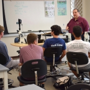 Dr. Kenneth Blank describes his activity to Model Lab students