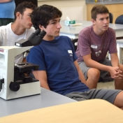 Model Lab students listen to Dr. Kenneth Blank instruct them on their activity