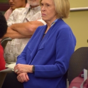 Jane Booth watches as Gary Booth receives award