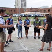 Dr. Kelly Watson gives Model Lab students instructions for their activity