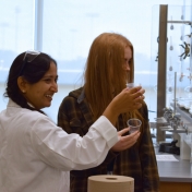 Dr. Radhika Dasari demonstrates a lab experiment