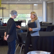 Dr. Melanie Link-Perez talks with Alumni Lecture speaker Ms. Erika Gil Winter