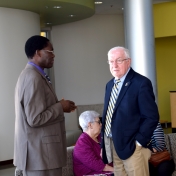 Dr. Tom Otieno speaks with Donald Whitaker, College of Science award recipient