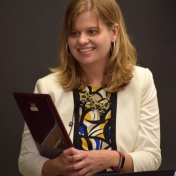 Dr. Tracie Prater with award plaque