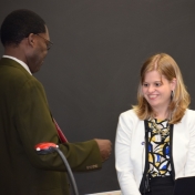 Dr. Tom Otieno presents Dr. Tracie Prater with College of Science Award