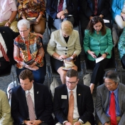 The audience listens to speakers at dedication ceremony.