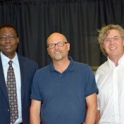 Tom Otieno and Erik Liddell pose with Chautauqua keynote speaker Oswald Schmitz