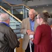 Dr. Bob Fraas, retired Chemistry facutly visits at retirement dinner