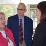 Dr. and Mrs. John Davidson talk to Dr. Betina Gardner