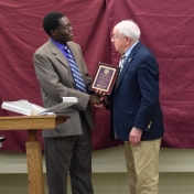 Dr. Tom Otieno presents Donald Whitaker with the College of Science award